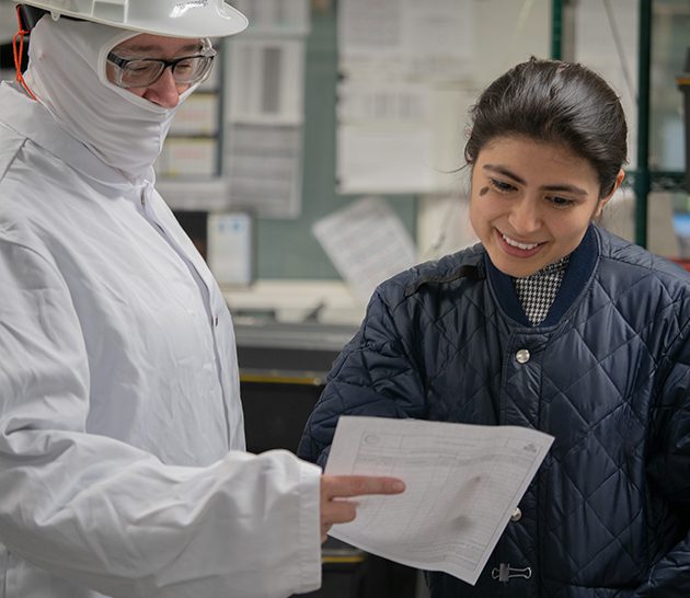 Team members reviewing paperwork.